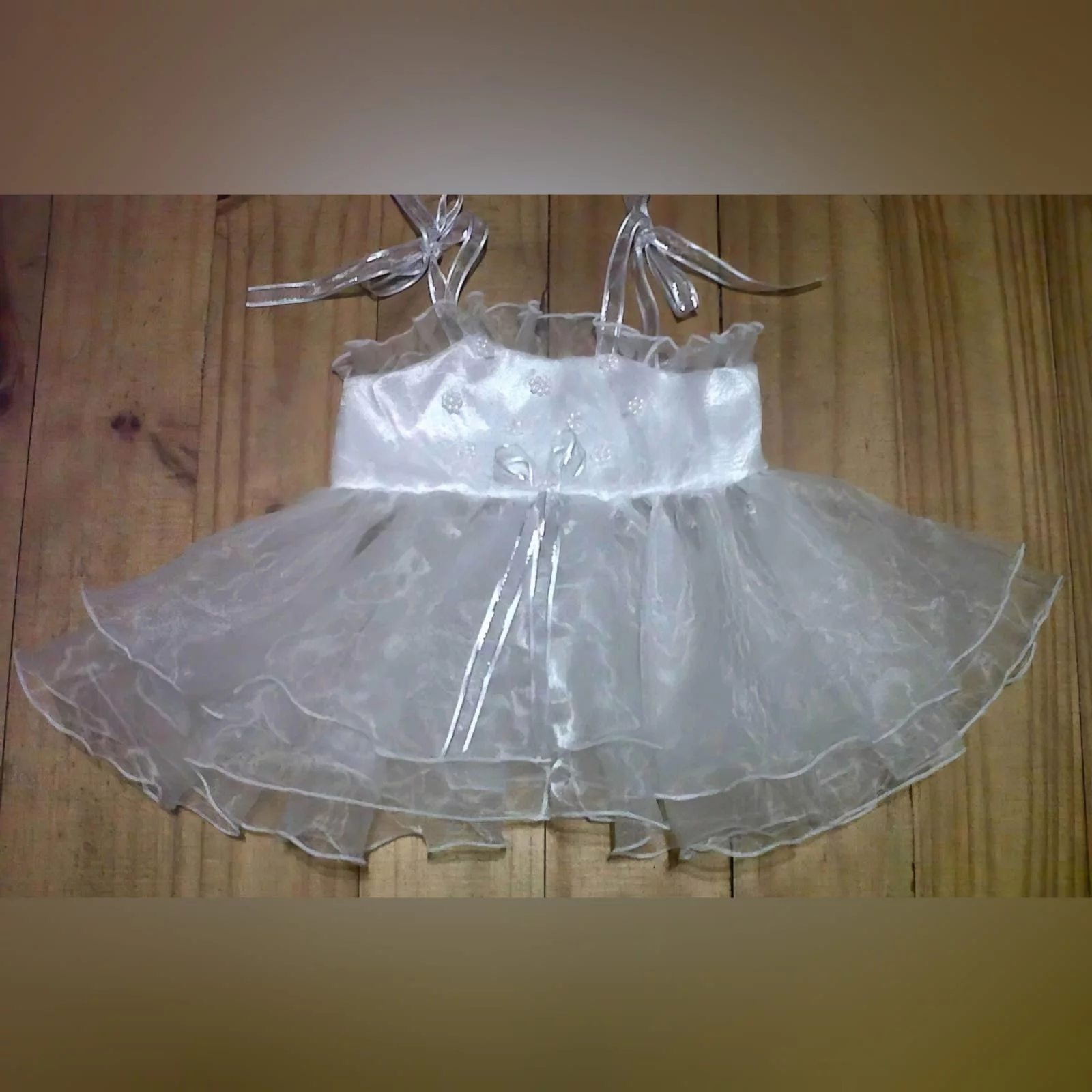 White bridal organza baptism dress 2 baptism dress made with satin and organza with pearl details and silver edged ribbon, with a frill on the neckline