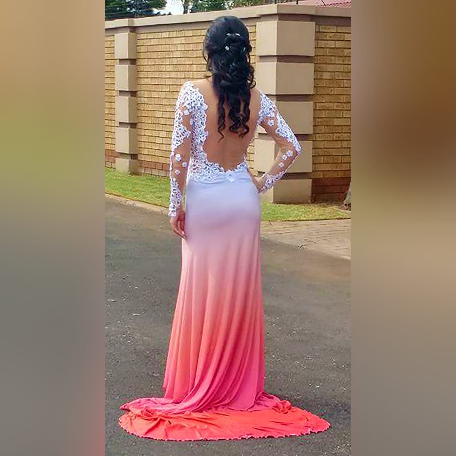 White and peach ombre matric farewell dress with a white lace bodice 5 white and peach ombre matric farewell dress with a white lace bodice, an illusion open back and long sleeves. With a slit and a train.