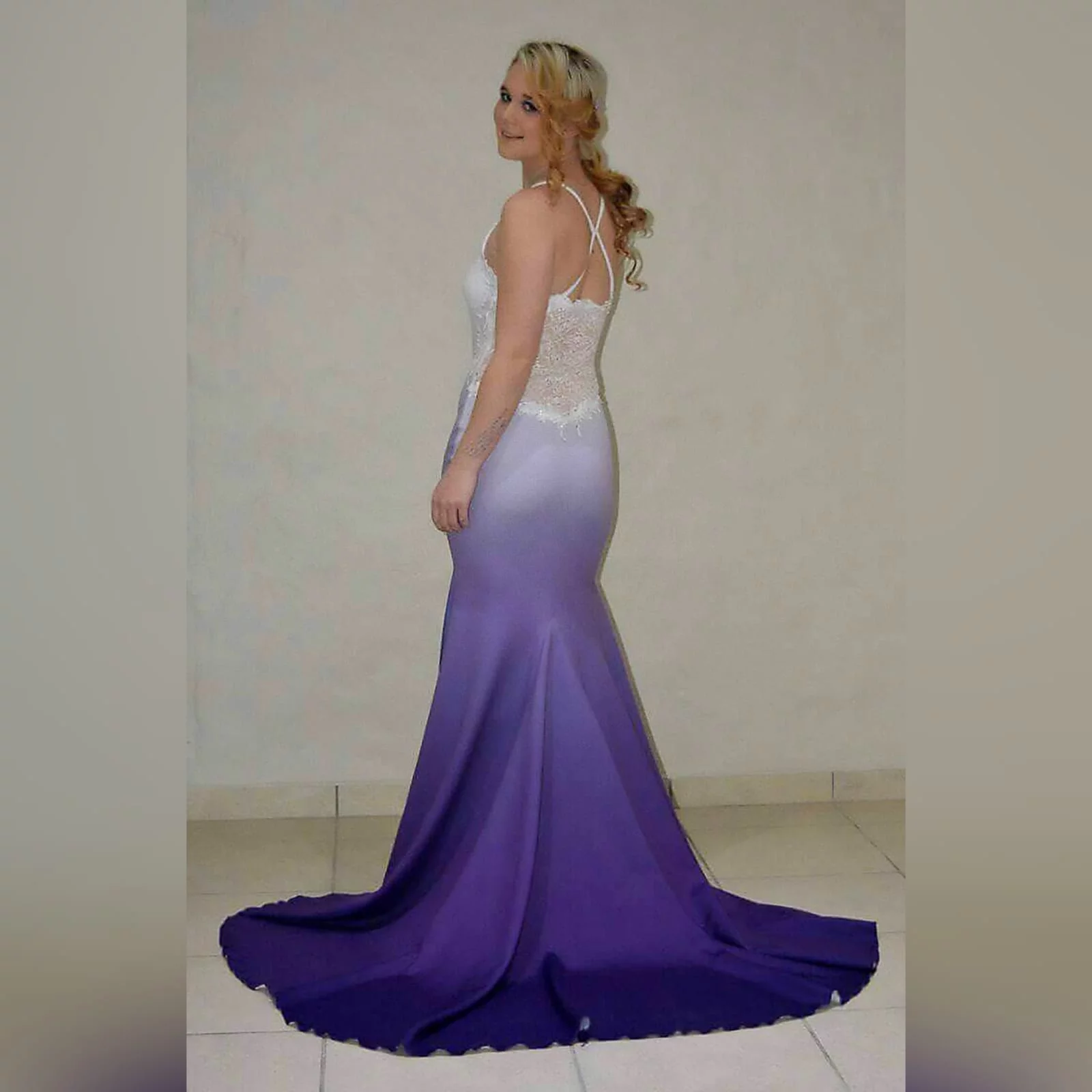 White & purple ombre soft mermaid prom dress 8 white & purple ombre soft mermaid prom dress with a sheer lace back. A sweetheart neckline. With a touch of silver beads and a train.