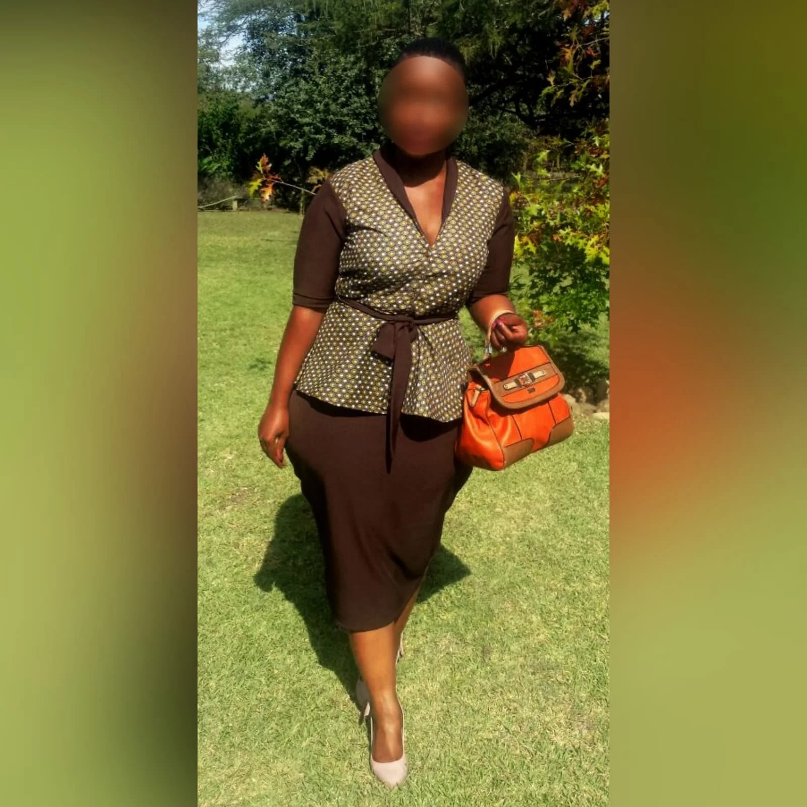 Xhosa traditional wear blouse and matching brown pencil skirt 1 a pencil skirt below the knee with a back slit. With a xhosa traditional blouse. Blouse with sleeves, collar and belt in brown matching the skirt.