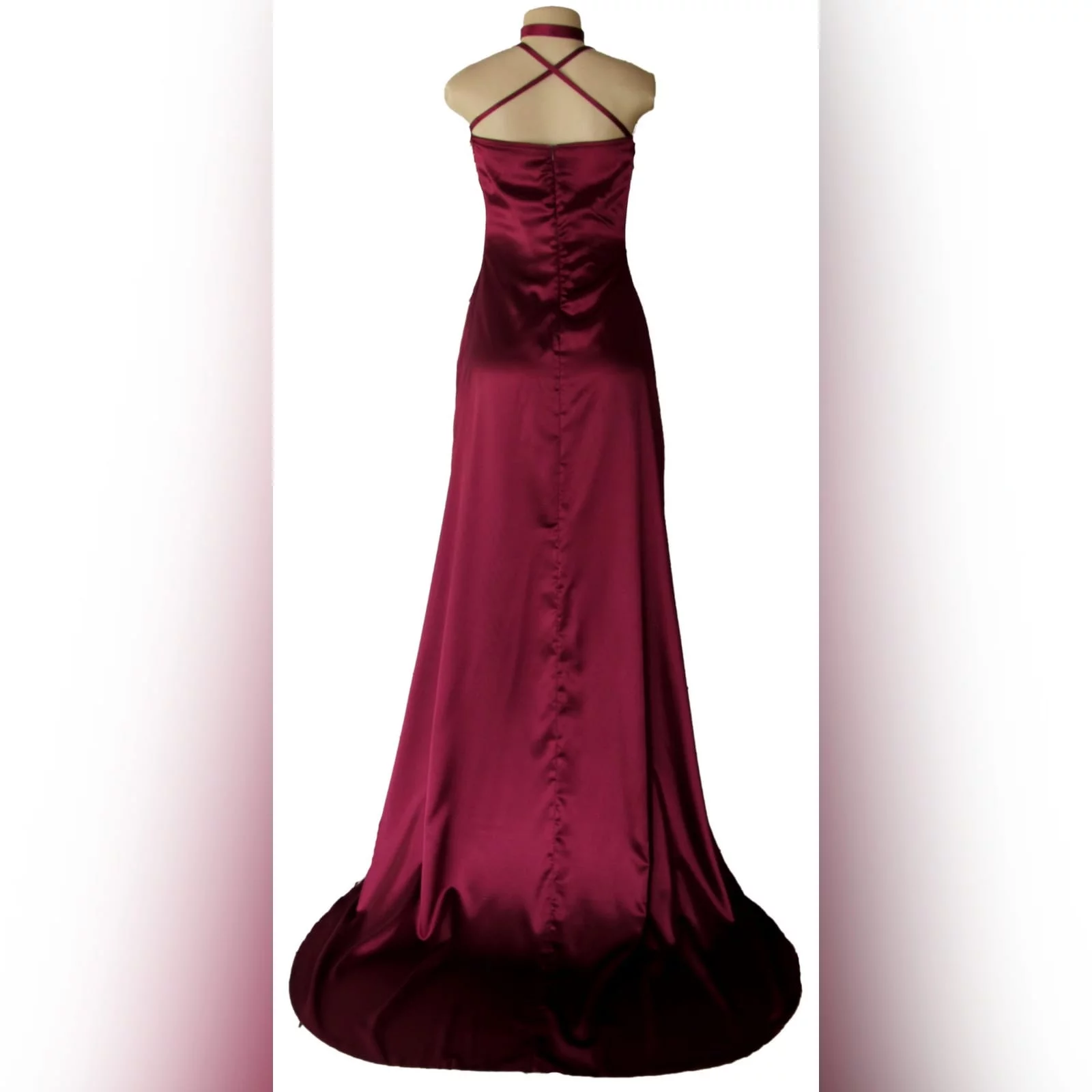 Burgundy satin flowy matric dance dress 7 burgundy satin flowy matric dance dress with thin shoulder straps crossed at the back, with a high slit and a train, with a matching choker.