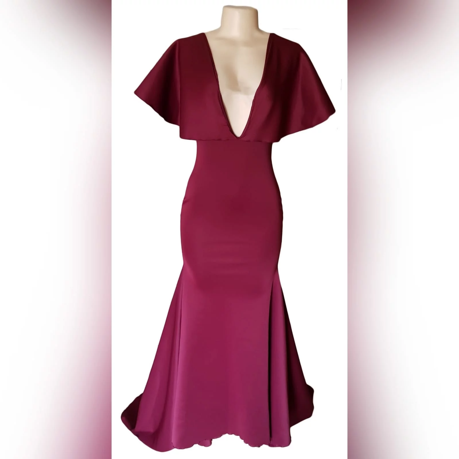 Burgundy plunging neckline soft mermaid matric dress 5 burgundy plunging neckline soft mermaid matric dress with flare short sleeves. Backless effect and a train.