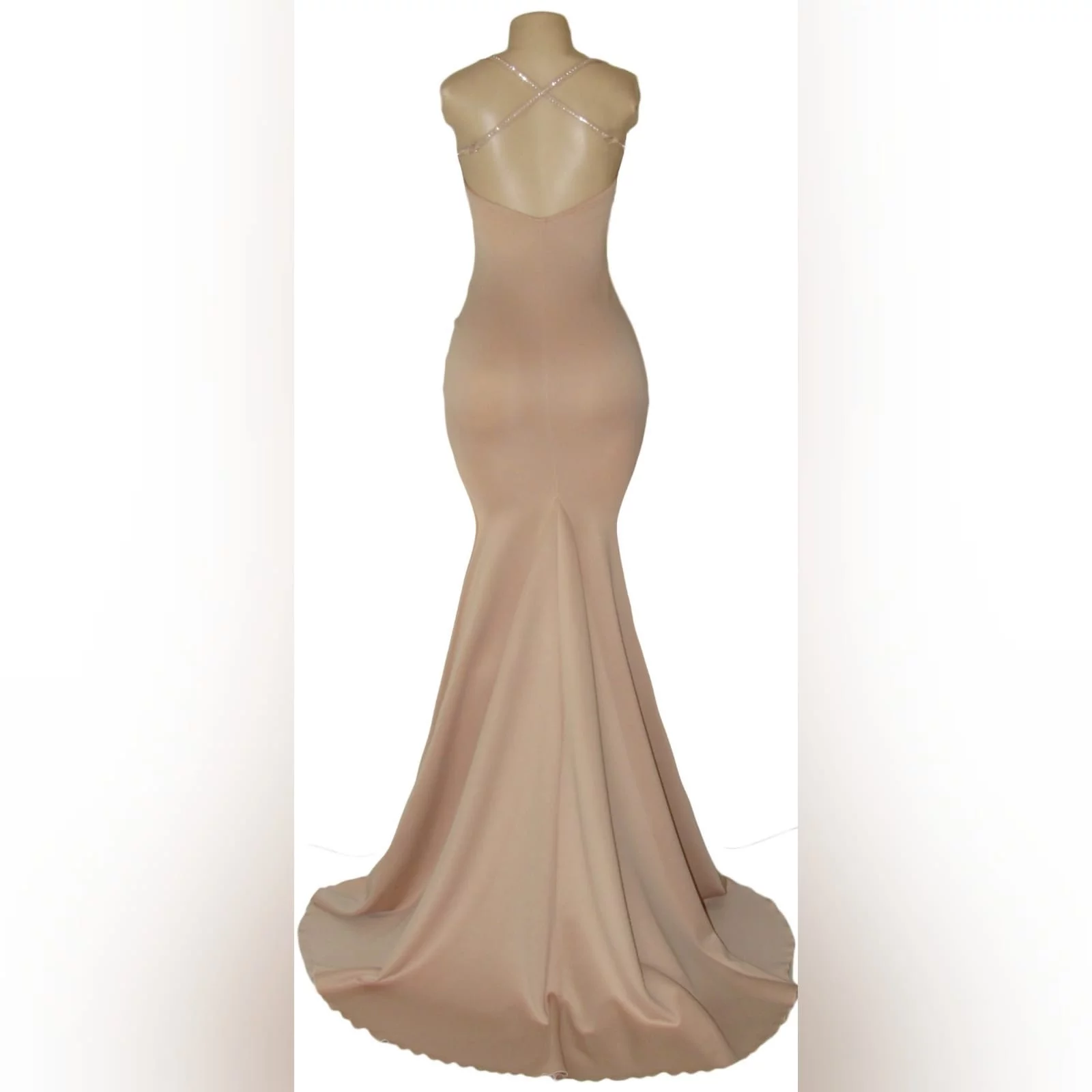 Nude simple mermaid prom dress 5 nude simple mermaid prom dress with a sweetheart neckline, open back, thin shoulder straps crossed at the back and detailed with diamante. Dress with a train.