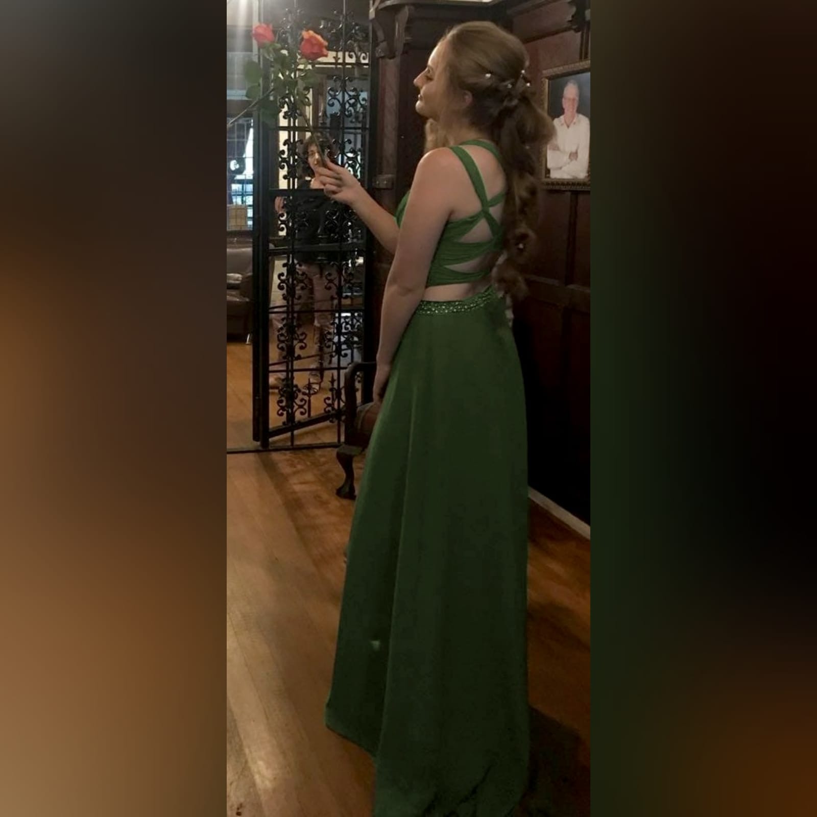 Olive green 2 piece prom dress 5 olive green 2 piece prom dress. Flowy long chiffon shirt with a little train and waistband detailed with silver beads. Pleated crop top with a rounded deep neckline , backless design with strap detail.