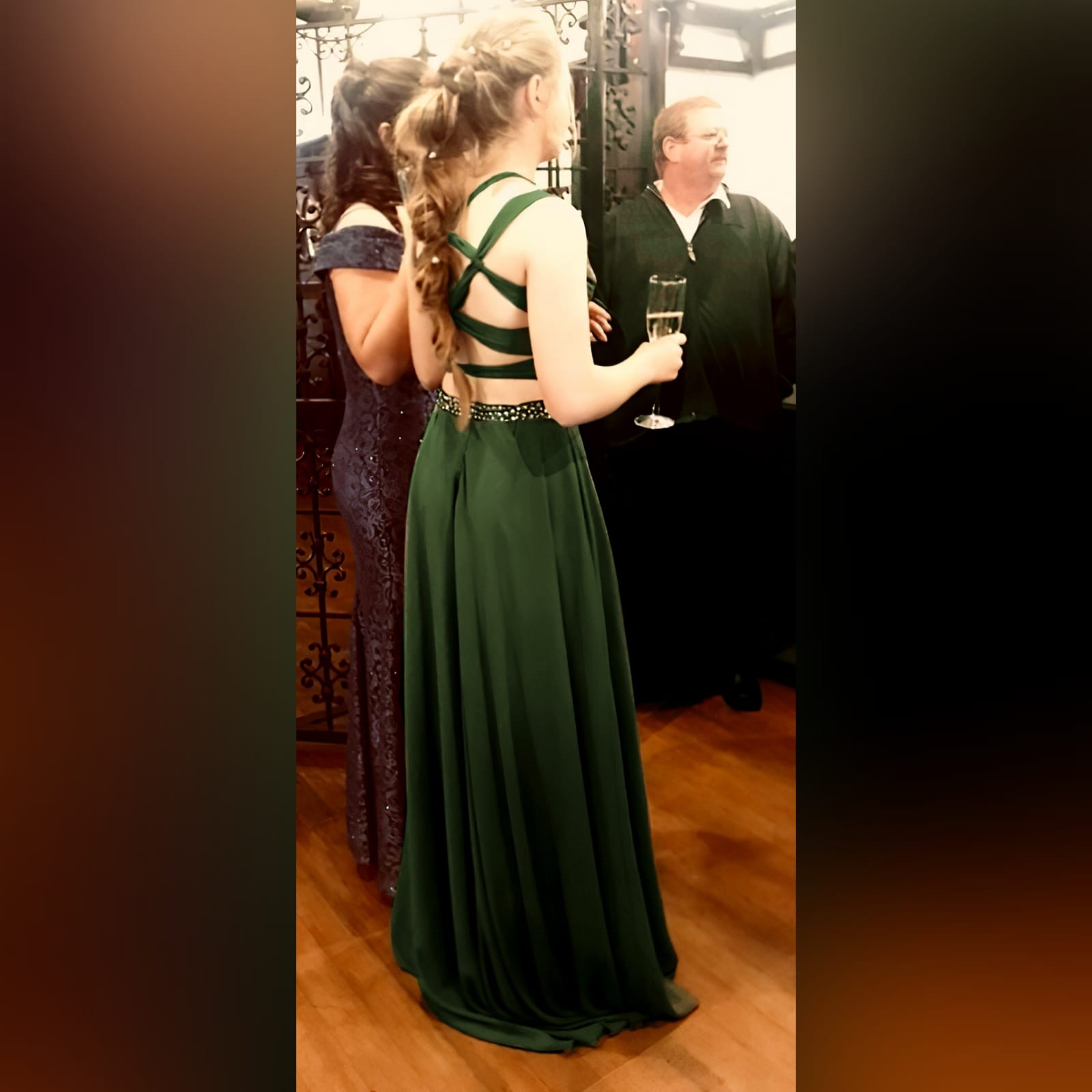 Olive green 2 piece prom dress 7 olive green 2 piece prom dress. Flowy long chiffon shirt with a little train and waistband detailed with silver beads. Pleated crop top with a rounded deep neckline , backless design with strap detail.