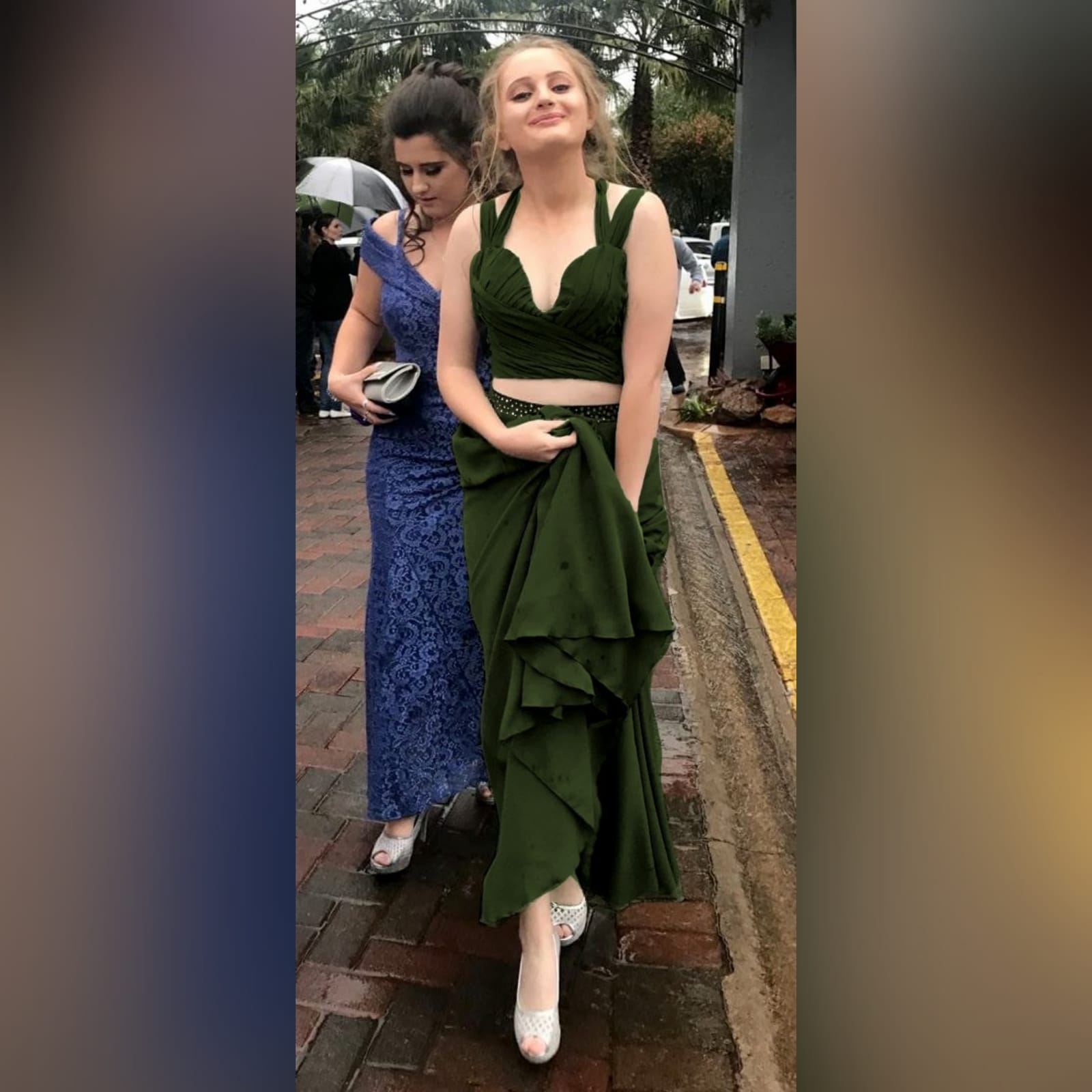 Olive green 2 piece matric dance dress 2 olive green 2 piece matric dance dress. Flowy long chiffon shirt with a little train and waistband detailed with silver beads. Pleated crop top with a rounded deep neckline , backless design with strap detail.