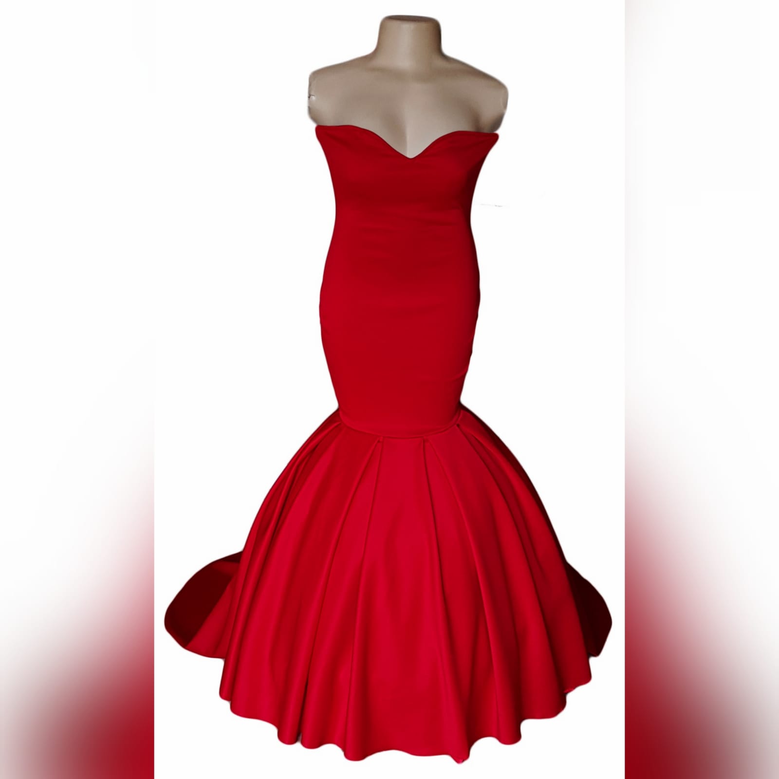 Bright red boobtube mermaid prom dress 2 bright red boobtube mermaid prom dress with a sweetheart neckline, bottom with volume and a train.
