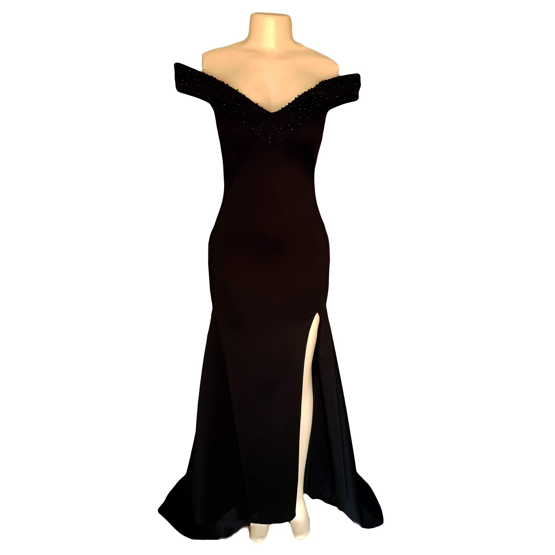 Black off shoulder fitted long prom dress 9 black off shoulder fitted long prom dress, with a beaded neckline and off-shoulder sleeves with a slit and a train.