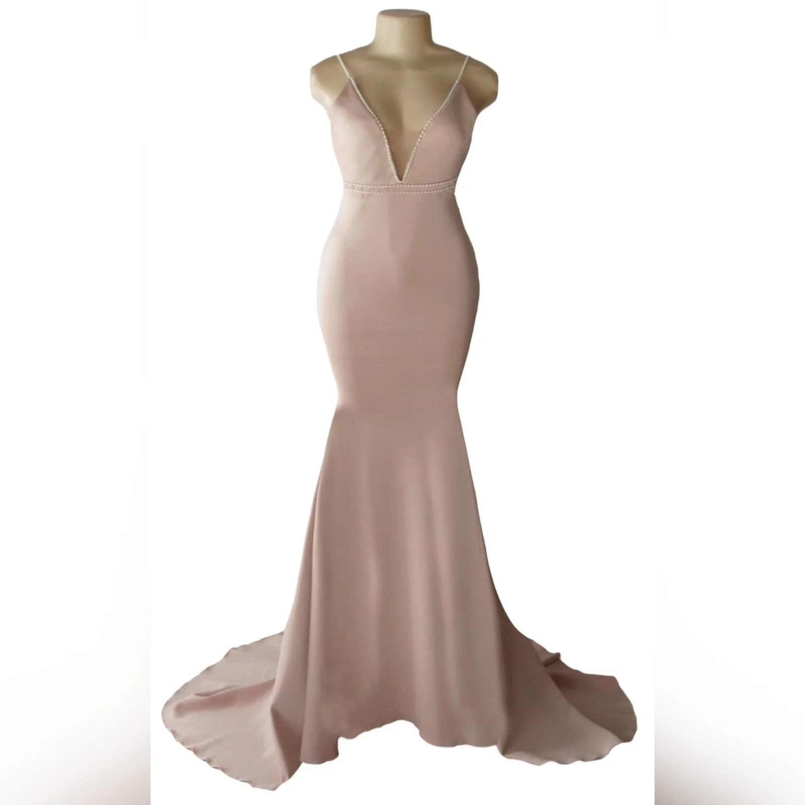 Pink nude soft mermaid prom dress with pearls 5 pink nude soft mermaid prom dress with an illusion plunging neckline, with a low open back, detailed with pearls on the waist and shoulder straps.