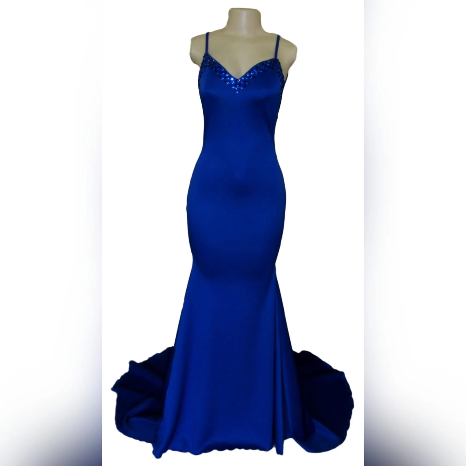 Royal blue soft mermaid beaded prom dress 2 royal blue soft mermaid beaded prom dress, with a v neckline, low v open back detailed with blue and black beads, thin shoulder straps and a long train.
