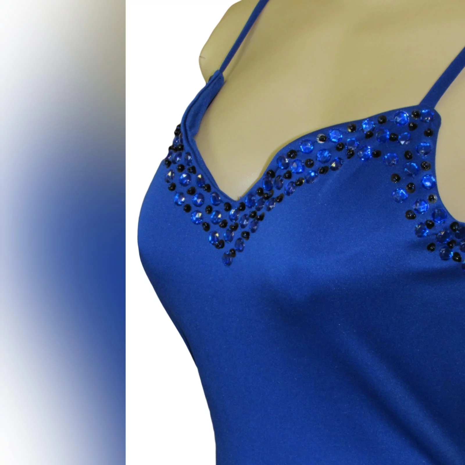 Royal blue soft mermaid beaded prom dress 4 royal blue soft mermaid beaded prom dress, with a v neckline, low v open back detailed with blue and black beads, thin shoulder straps and a long train.