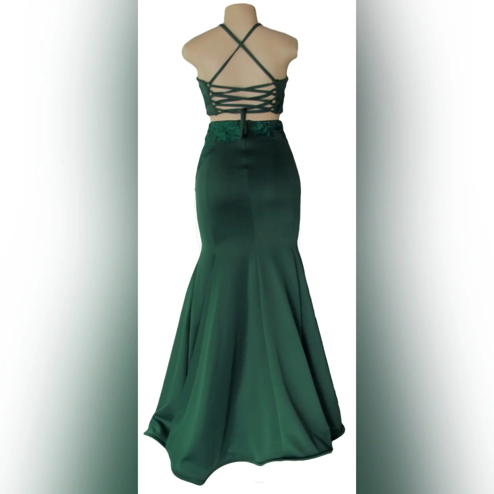 2 piece emerald green mermaid prom dress 4 2 piece emerald green mermaid prom dress. A gorgeous crop top with a lace-up open back, with a mermaid skirt. Lace detail on skirt and top for a classic touch.