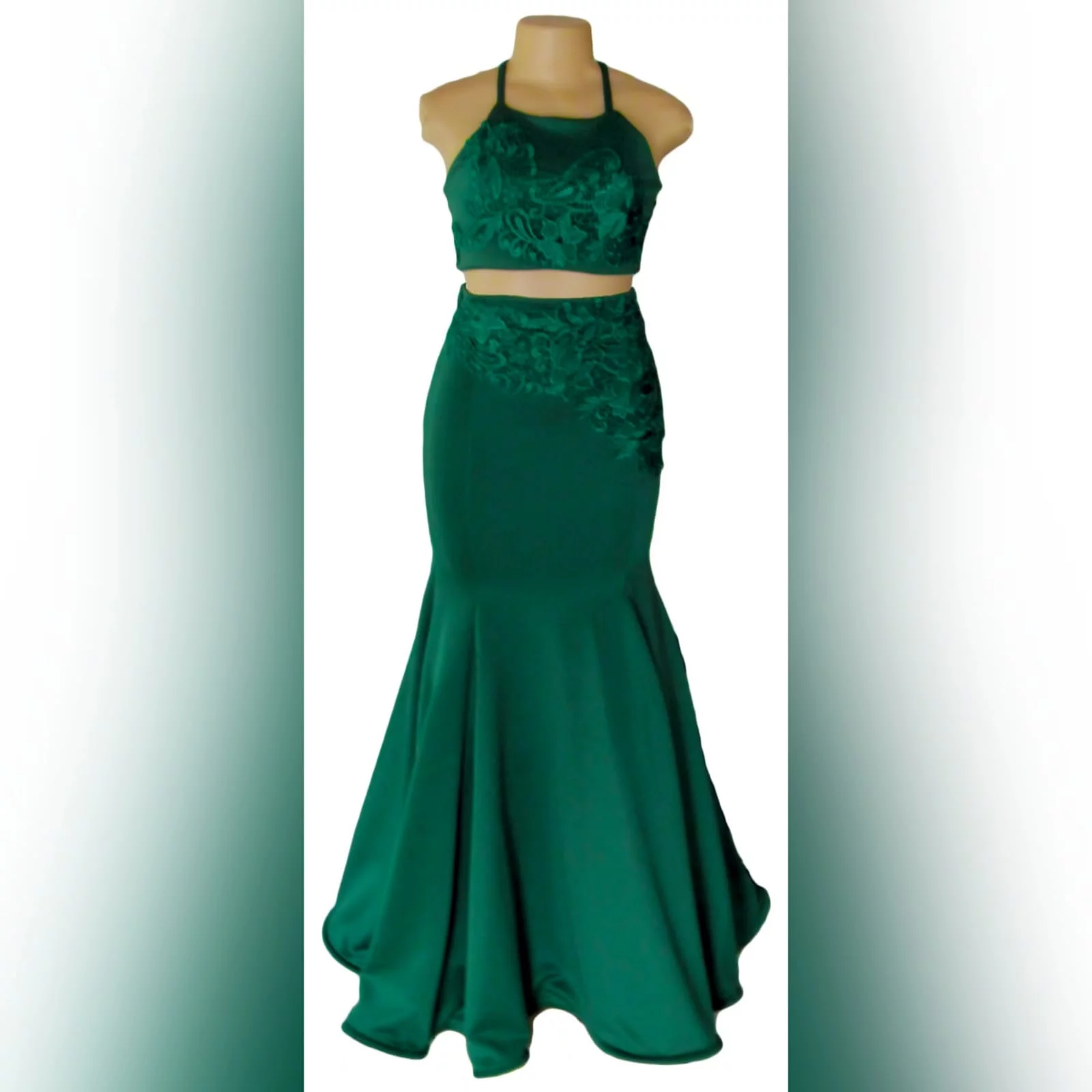2 piece emerald green mermaid prom dress 5 2 piece emerald green mermaid prom dress. A gorgeous crop top with a lace-up open back, with a mermaid skirt. Lace detail on skirt and top for a classic touch.