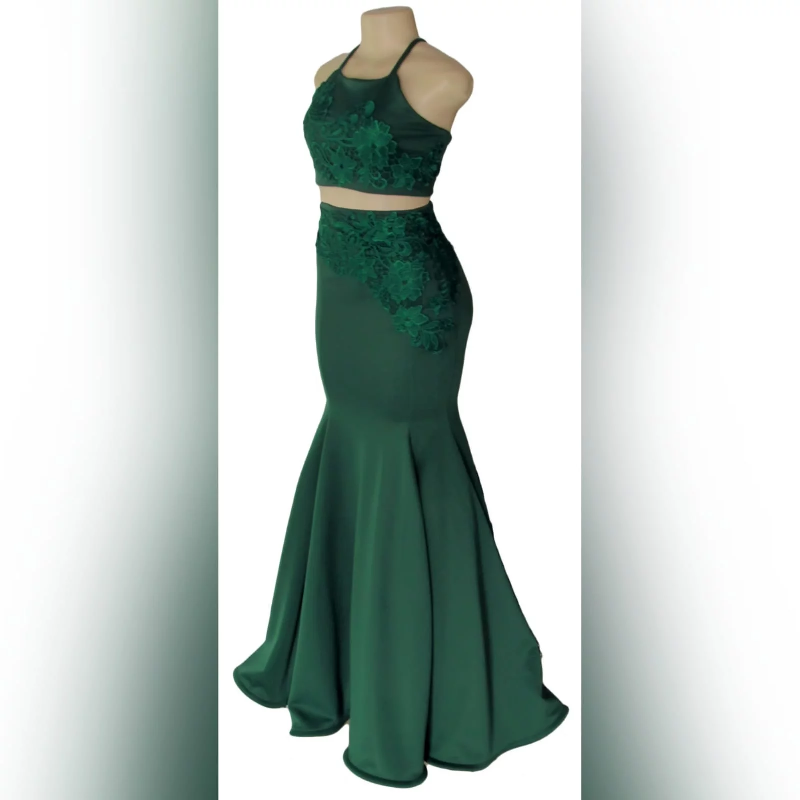 2 piece emerald green mermaid prom dress 8 2 piece emerald green mermaid prom dress. A gorgeous crop top with a lace-up open back, with a mermaid skirt. Lace detail on skirt and top for a classic touch.