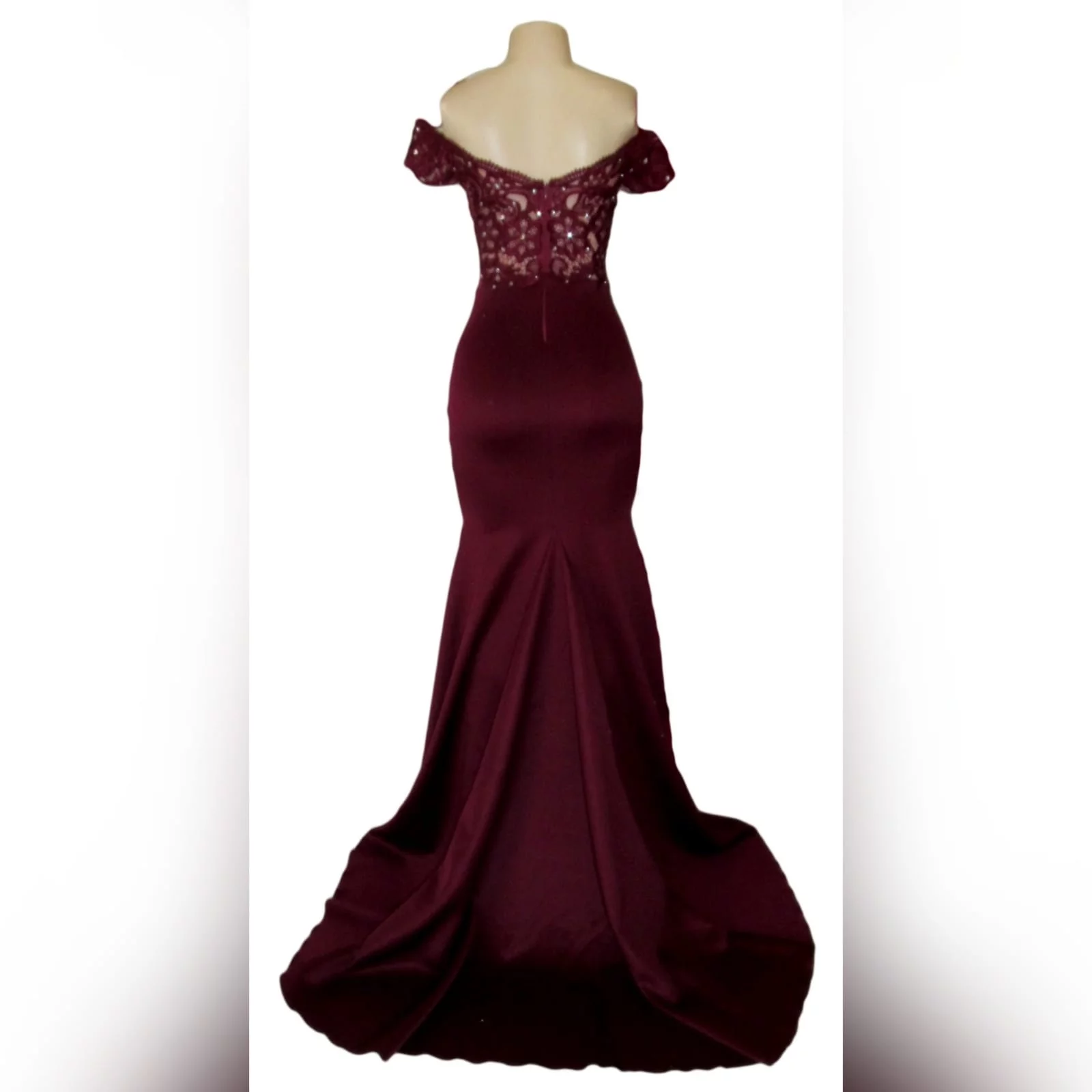 Burgundy off shoulder long matric dance dress 3 burgundy off shoulder long matric dance dress. With an illusion bodice detailed with lace and beads and off-shoulder short sleeves. Bottom fitted till hip, with a high slit and a train for a touch of sexy and drama.