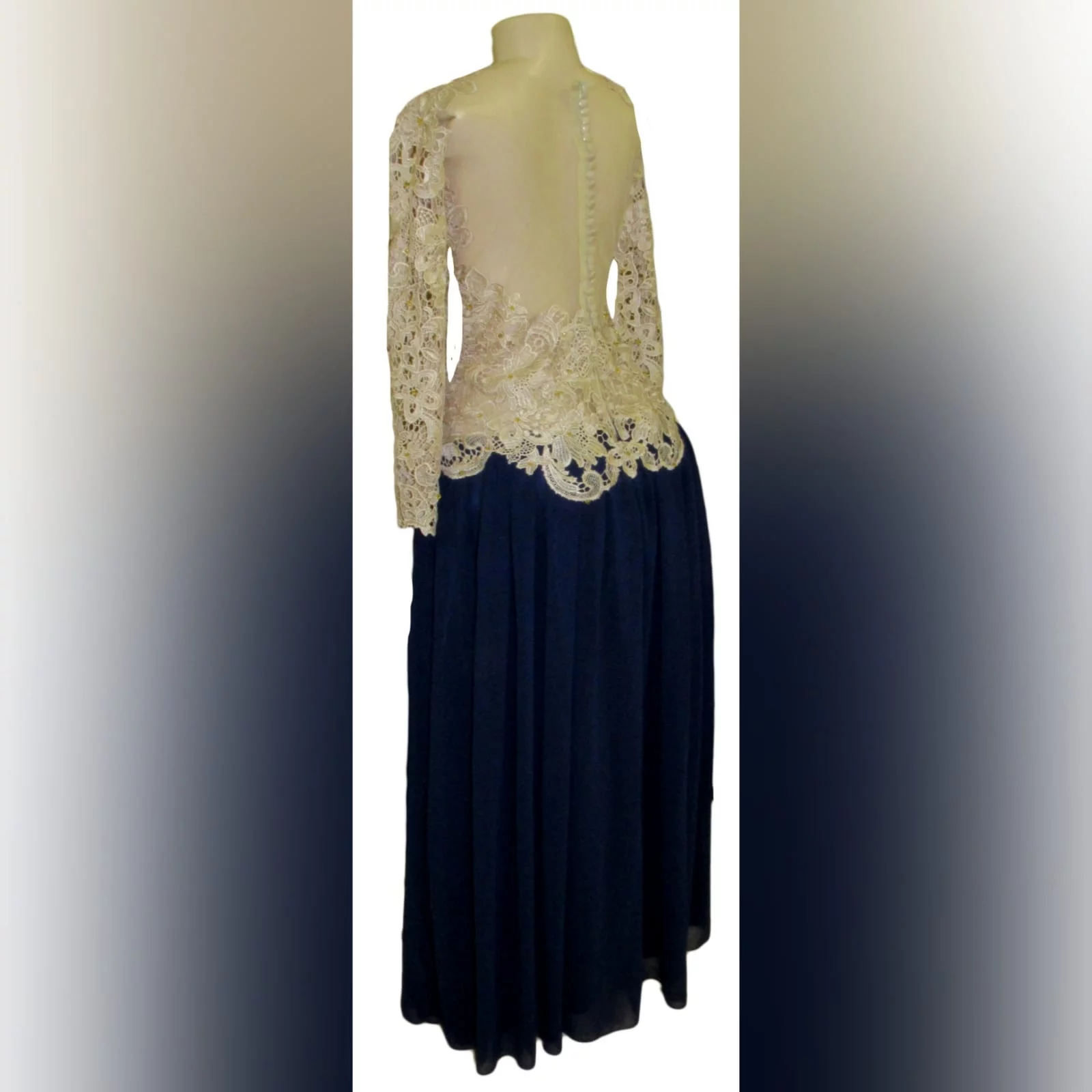 Navy blue and champagne lace prom dress 6 this evening dress design is a classic and can be worn to several occasions. Navy blue and champagne lace prom dress, with a lace bodice and long sleeves, illusion open back detailed with buttons and gold beads. Bottom in a navy blue gathered chiffon adding a great movement to the dress.