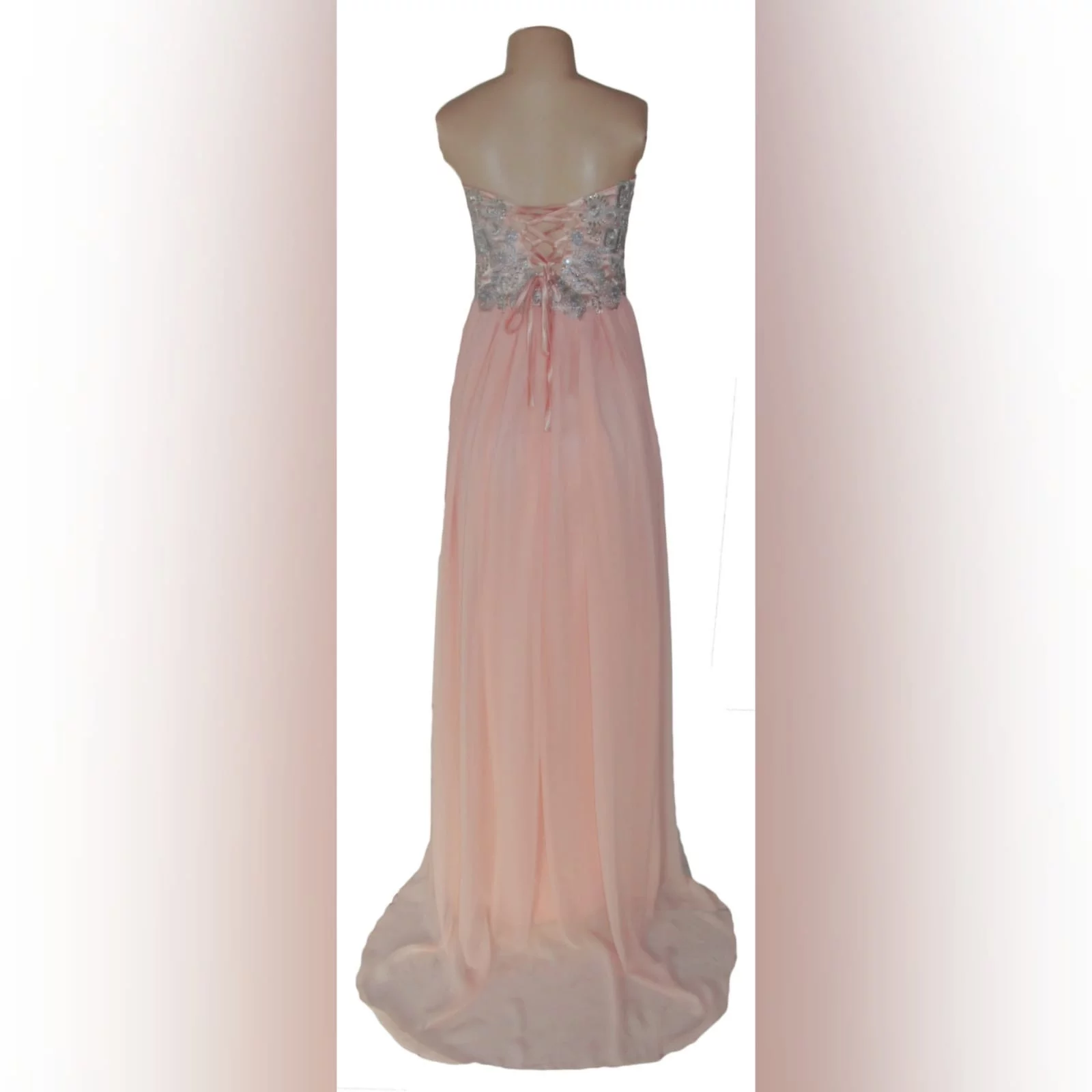 Peach and silver fun prom dress 7 peach and silver fun prom dress. Bodice detailed with appliques and beads, with a lace-up back. Bottom with gathered chiffon and an overlayer opened in front.