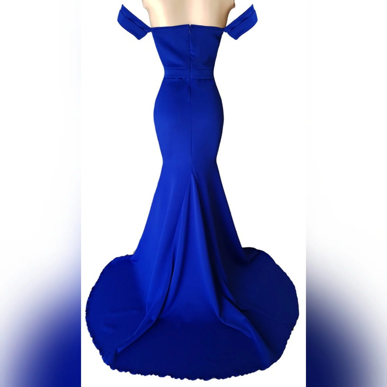Simple royal blue soft mermaid dress 5 a simple royal blue soft mermaid dress, created for a debutantes ball. With a modern off-shoulder neckline and off-shoulder short sleeves. A belt effect to enhance the waist and a train for a touch of drama.