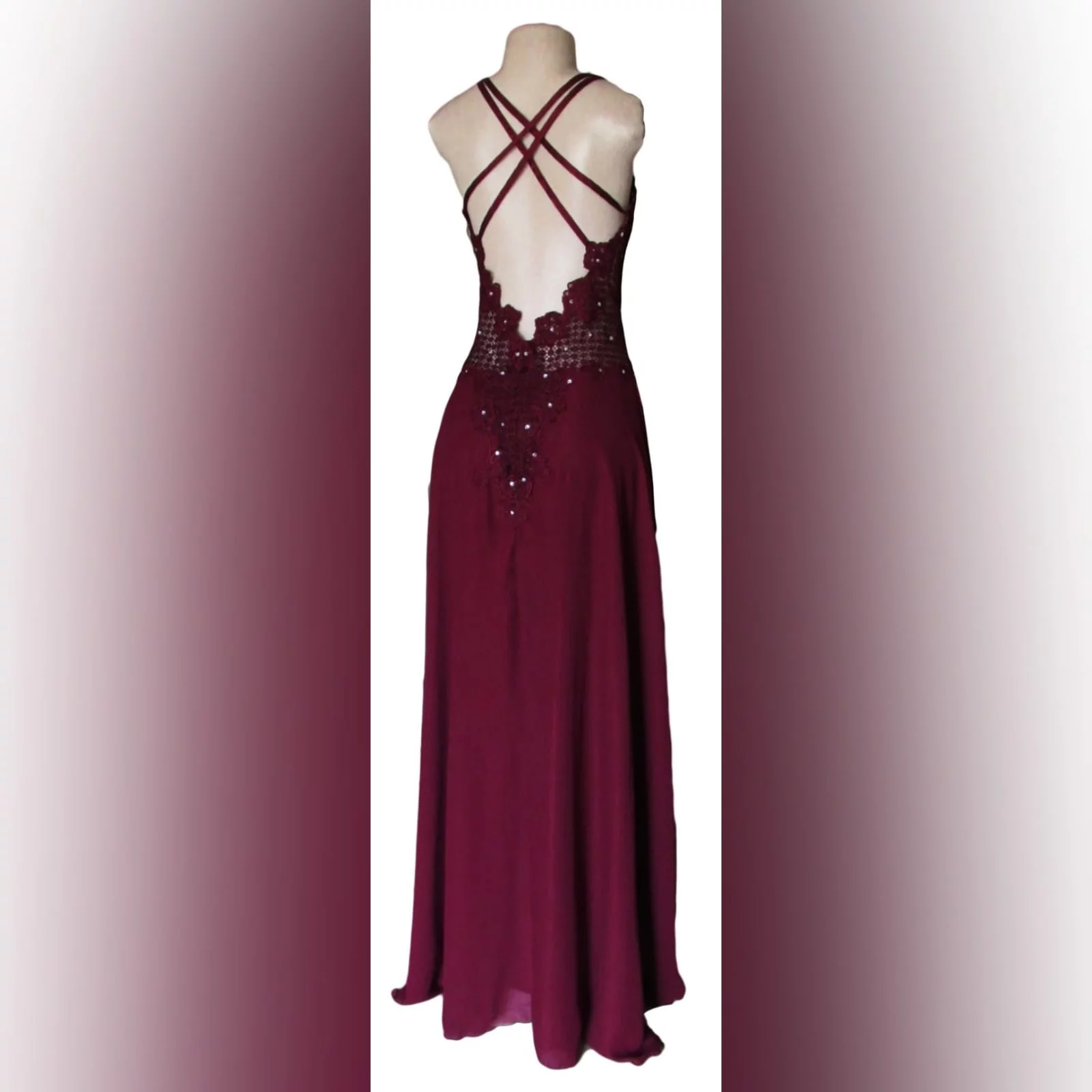 Burgundy chiffon and lace matric dance dress 8 burgundy chiffon and lace matric farewell dress. Bodice in lace, with a v neckline and v low open back, with double shoulder crossed straps. Bodice detailed with silver beads. Bottom in flowy chiffon with a slit.