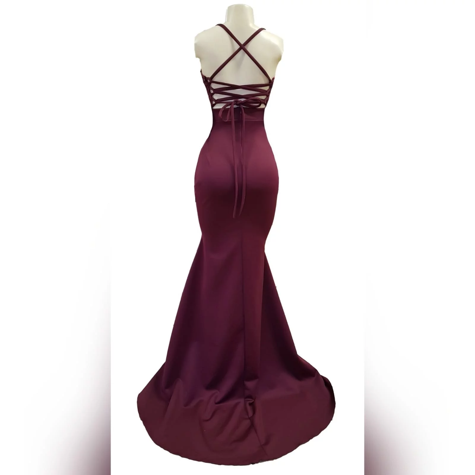 Burgundy soft mermaid plus size prom dress 8 burgundy soft mermaid plus size prom dress. Bodice detailed with lace and silver beads, small triangle opening on the waist with waistband finish. Open laceup back and a train.