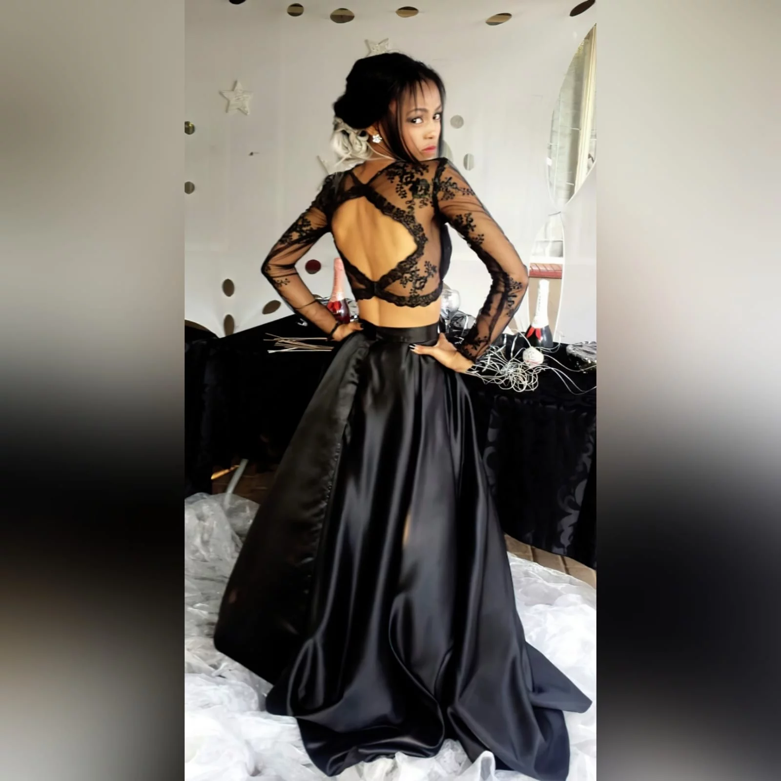 2 piece black prom dress with lace top 2 my client looked stunning in the 2 piece black prom dress i created for her. A lace top with sheer neckline and long sleeves, with a diamond shape opening. With a wide, flowy duchess's satin skirt