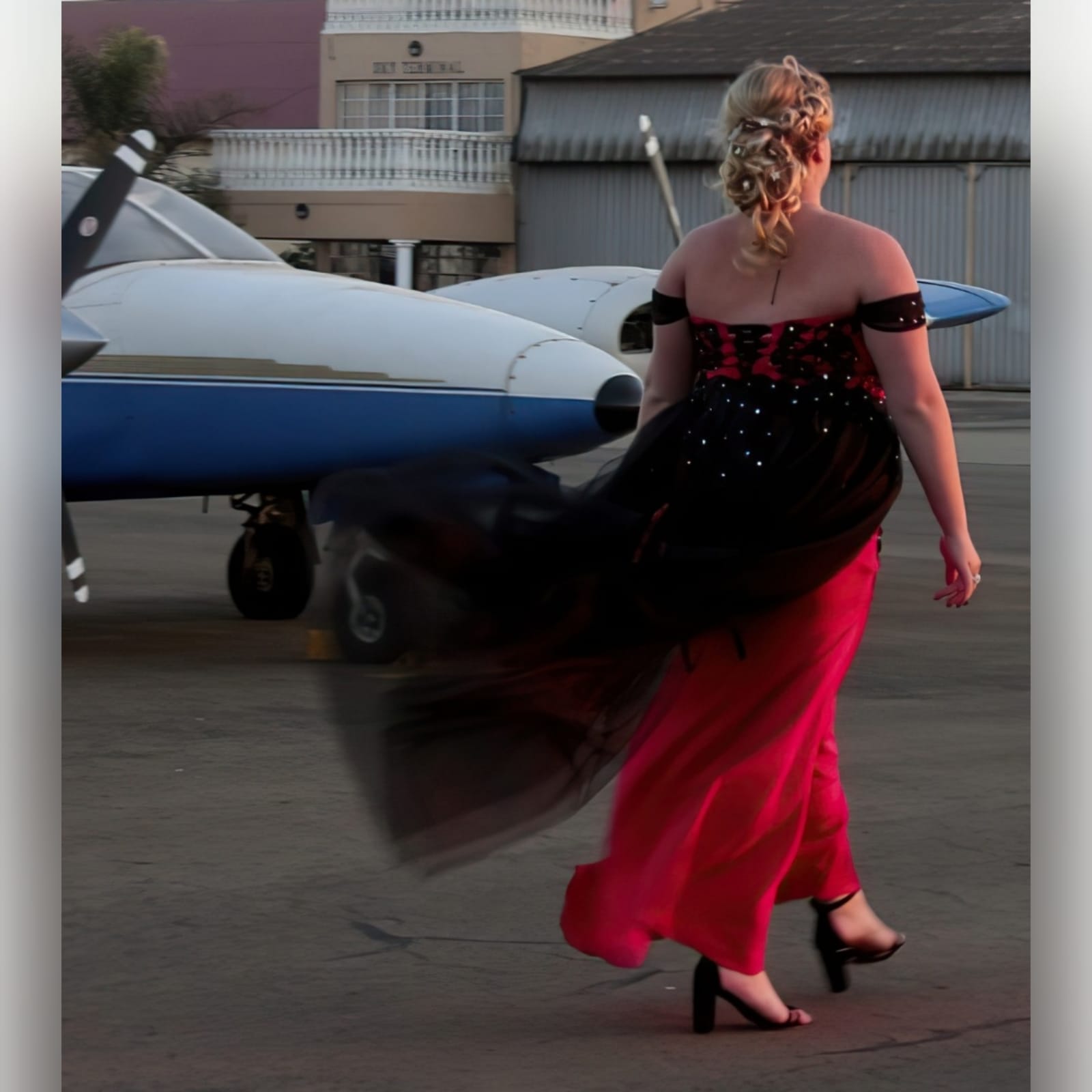 Red and black plus size matric dress 4 red and black plus size matric dress. Off-shoulder fitted dress with a flare from knee down, detailed with black lace and silver beads. Tulle black skirt attached to the waist to create a dramatic effect.