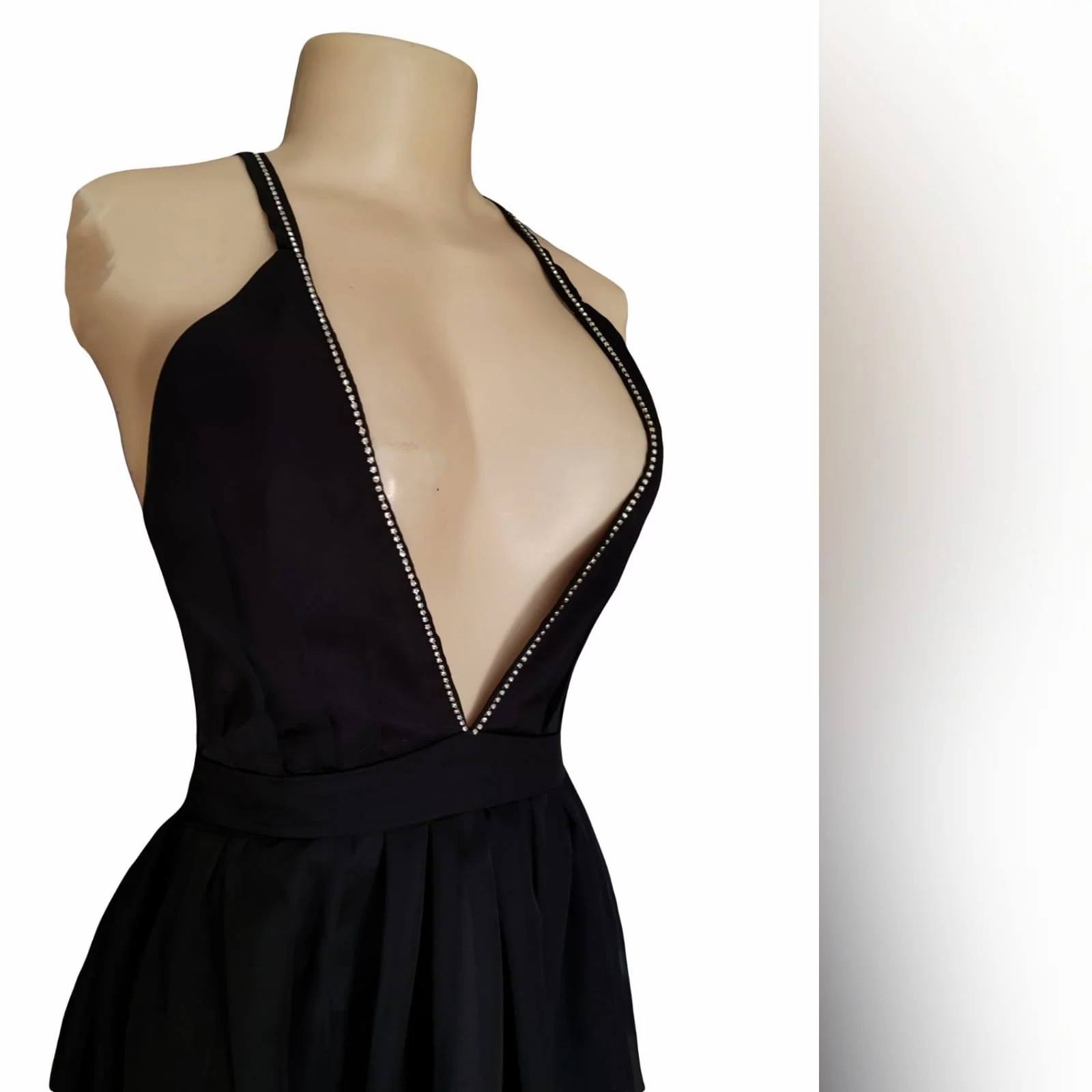 Sexy black plunging neckline prom dress 5 sexy black plunging neckline prom dress, with a naked back, crossed straps detailed with diamante and 2 slits