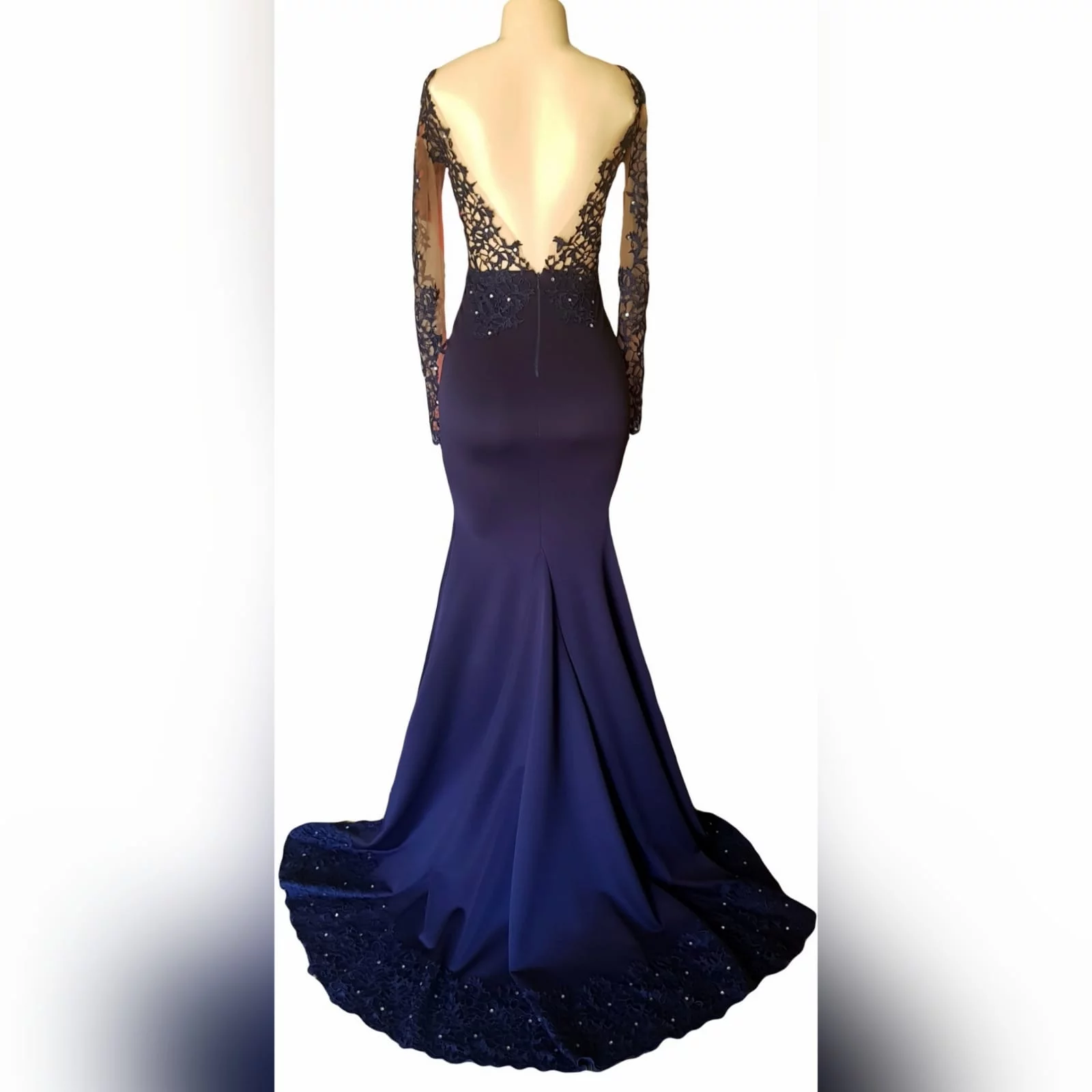 Custom-designed navy blue mermaid prom dress 10 <em>"a girl should be two things: who and what she wants. "</em> <em>coco chanel</em> looking stunning on her prom night, she wore a custom-designed and made the dress to fit her like a glove. This navy blue mermaid prom dress has a sheer lace bodice and sleeves, a lace border and scattered silver beads. A dramatic train and a v open back.