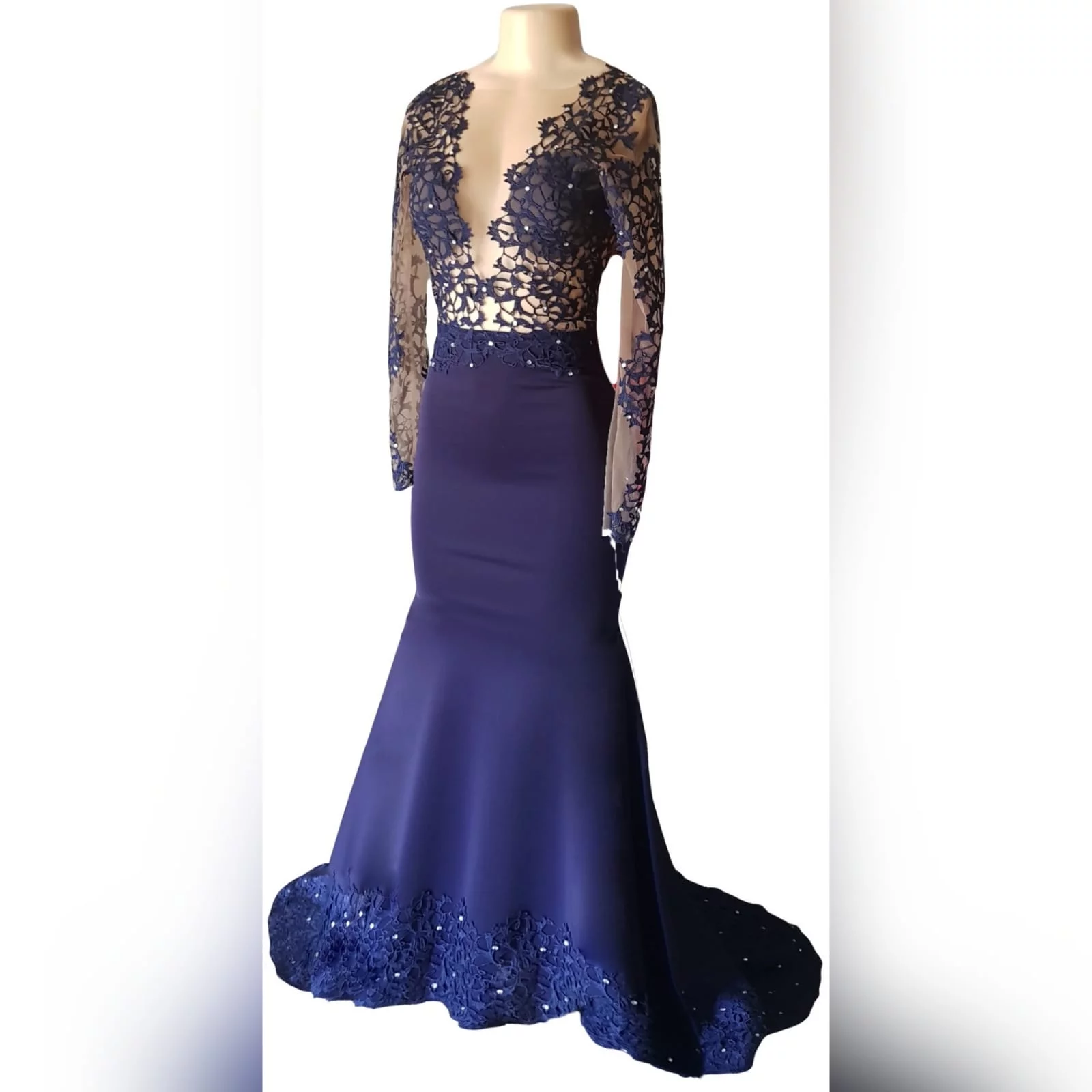 Custom-designed navy blue mermaid prom dress 8 <em>"a girl should be two things: who and what she wants. "</em> <em>coco chanel</em> looking stunning on her prom night, she wore a custom-designed and made the dress to fit her like a glove. This navy blue mermaid prom dress has a sheer lace bodice and sleeves, a lace border and scattered silver beads. A dramatic train and a v open back.