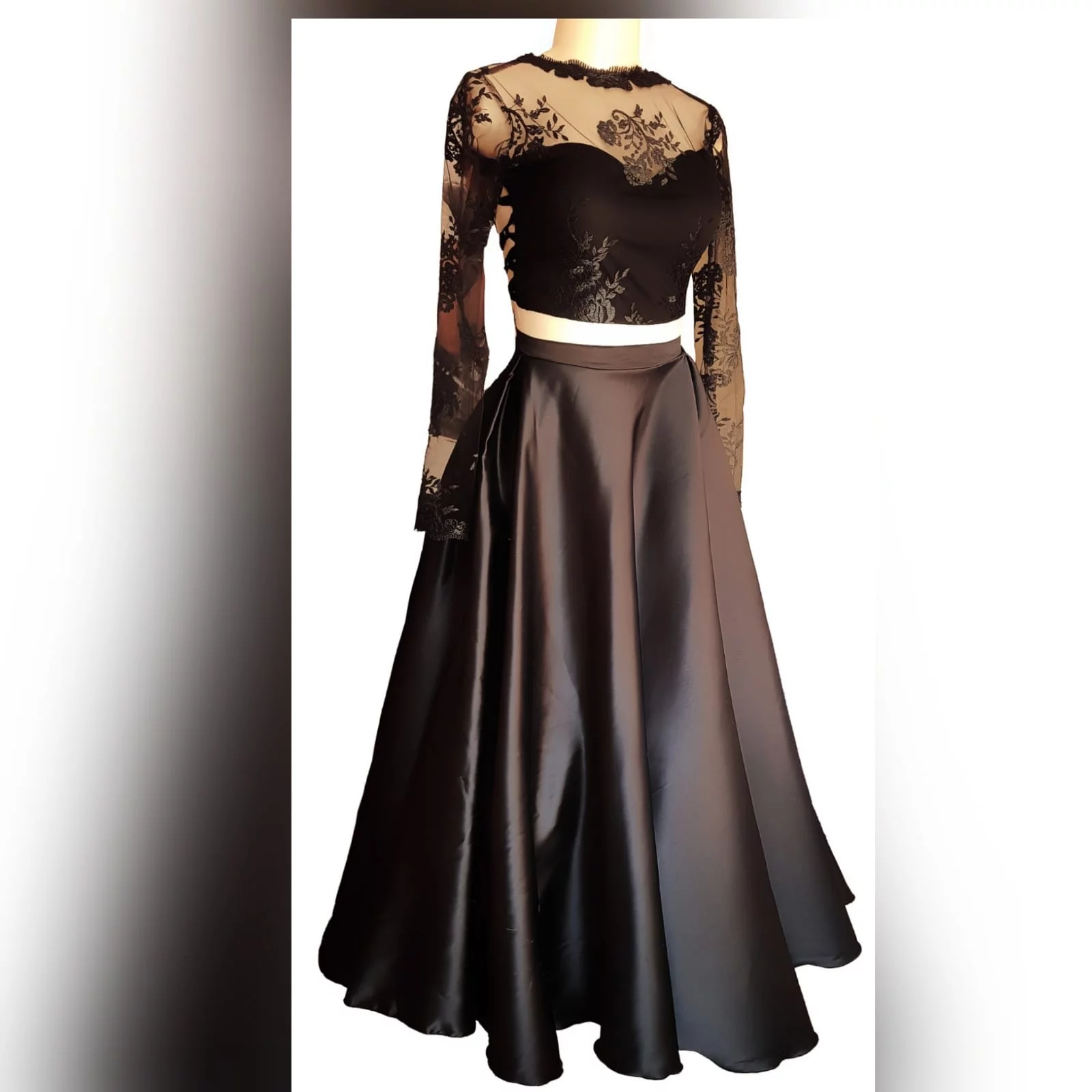 Gorgeous and fun 2 piece black dress 3 <blockquote>"be yourself; everyone else is already taken. "oscar wilde</blockquote> this gorgeous and fun 2 pieces black dress was created for a special occasion. Make memories with this luxurious satin wide skirt and a lace top with sheer neckline and sleeves and a tie-up back. Attend your ceremony looking formal and chic, then change the skirt to a part of pants or jeans for the after-party.