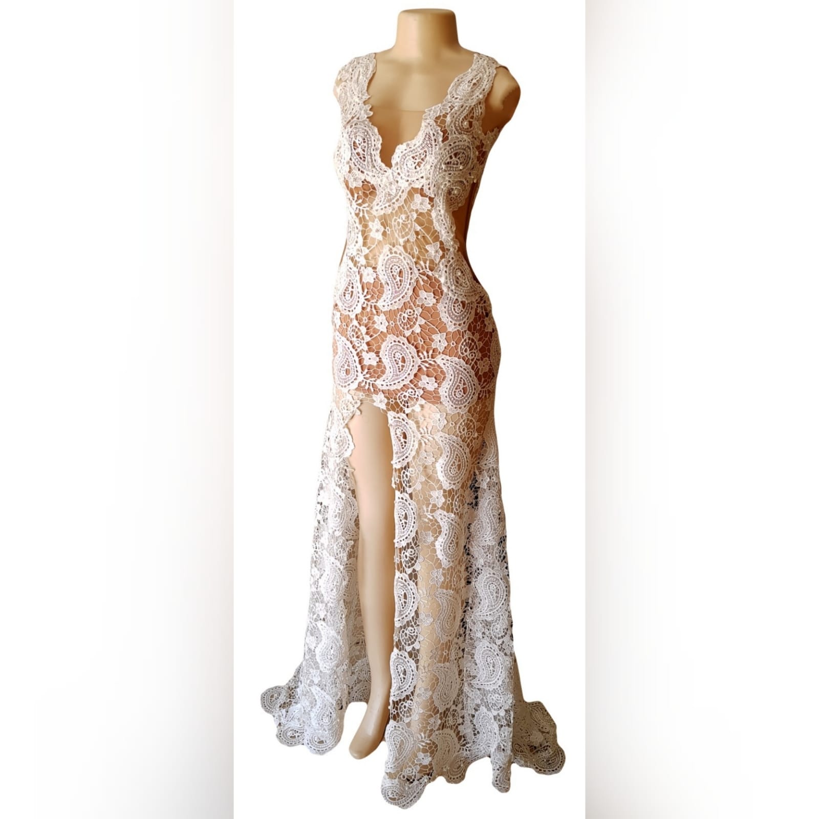 Classic long white lace gala dress 7 <blockquote>"doubt is a killer. You just have to know who you are and what you stand for. " jennifer lopez</blockquote> a classic long white lace gala dress created for my client to feel sophisticated and unique in her special occasion. Created with intention on bringing some sensuality to the design by adding translucent lace on the tummy and legs, see through sides and a frontal slit. Pearls finish this lace scattered throughout, with a train that just slightly sweeps the floor.