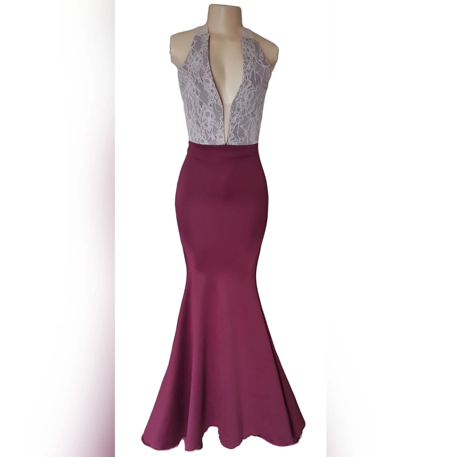 Simple elegant soft mermaid maroon prom dress 1 <blockquote>"you were born to stand out, stop trying to fit in". Roy t. Bennett</blockquote> simple elegant soft mermaid matric prom dress with an overlayer of cream lace on the bodice to add a unique touch to the design. Plunging neckline, low open back and lace wide crossed shoulder straps. With a matching lipstick/cellphone bag